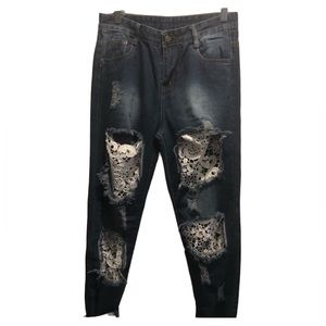 Distressed lace accent jeans